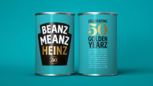 A tin of Heinz beans with the front label saying "Beanz meanz Heinz" and the reverse label saying "Celebrating 50 golden yearz"
